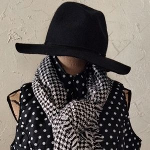 Woman within polka dot vest